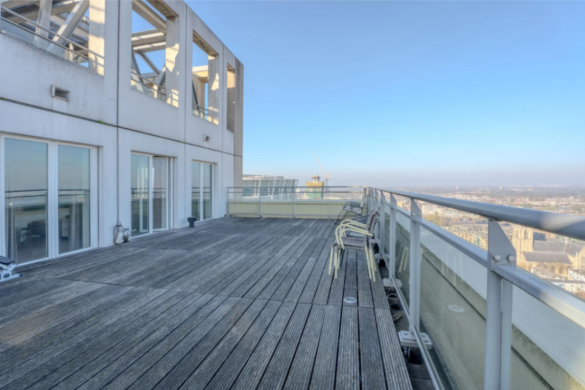 Private rooftop terrace wrapping around the penthouse